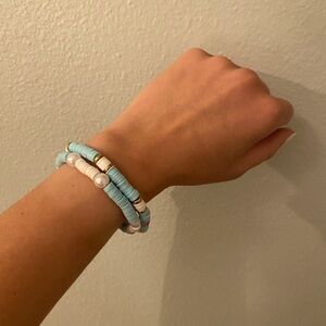 Blue bead bracelet stack